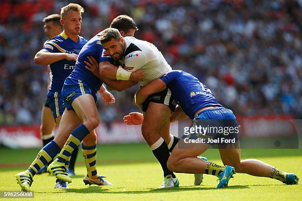 Josh Bowden of Hull FC trys to break through a tackle during the Ladbrokes Challenge Cup Final between Hull FC and Warrington Wolves at Wembley...