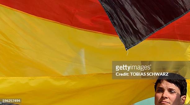 Alternative for Germany party chairwoman Frauke Petry attends an election campaign event in Wismar, northeastern Germany, on August 27, 2016. On...