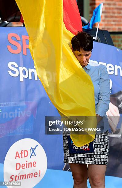 Alternative for Germany party chairwoman Frauke Petry attends an election campaign event in Wismar, northeastern Germany, on August 27, 2016. On...