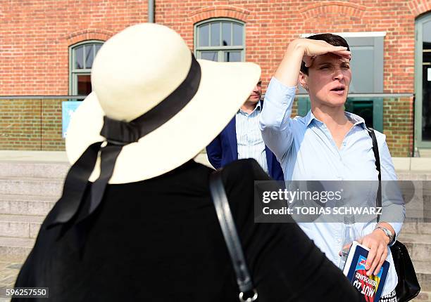 Alternative for Germany party chairwoman Frauke Petry attends an election campaign event in Wismar, northeastern Germany, on August 27, 2016. On...