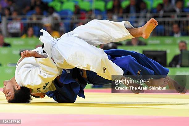 Naohisa Takato of Japan and Amiran Papinashvili of Georgia compete in the Men's -60 kg quarterfinal on Day 1 of the Rio 2016 Olympic Games at Carioca...