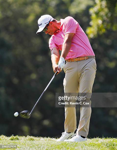Adam Scott of Australia hits his tee shot on the fifth hole during the third round of The Barclays in the PGA Tour FedExCup Play-Offs on the Black...