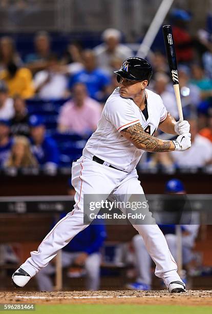 Oswaldo Arcia of the Miami Marlins at bat during the game against the Kansas City Royals at Marlins Park on August 24, 2016 in Miami, Florida.