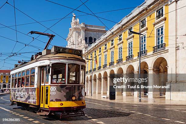 portugal, lisbon, tram at commerce square - praça do comércio fotografías e imágenes de stock