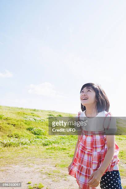 portrait of young girl - only kids at sky stock pictures, royalty-free photos & images
