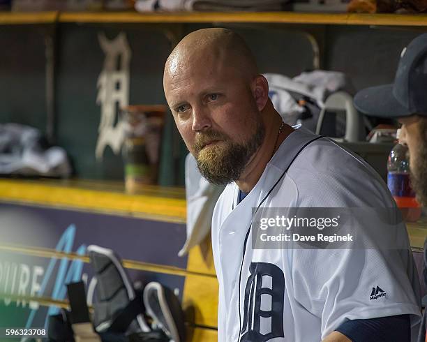 Casey McGehee of the Detroit Tigers sits in the dugout in the third inning during a MLB game against the Boston Red Sox at Comerica Park on August...