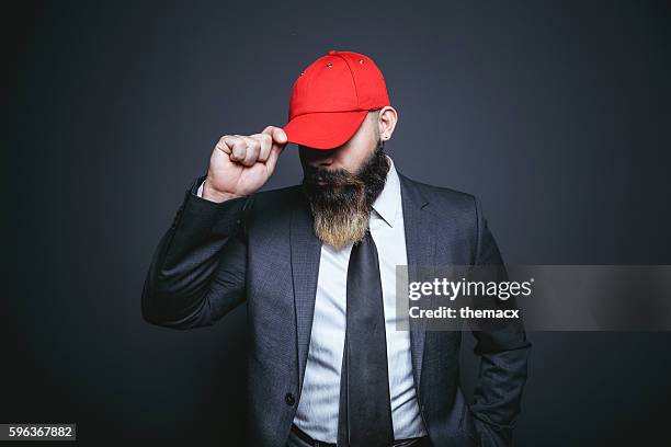 portrait of businessman - röd hatt bildbanksfoton och bilder