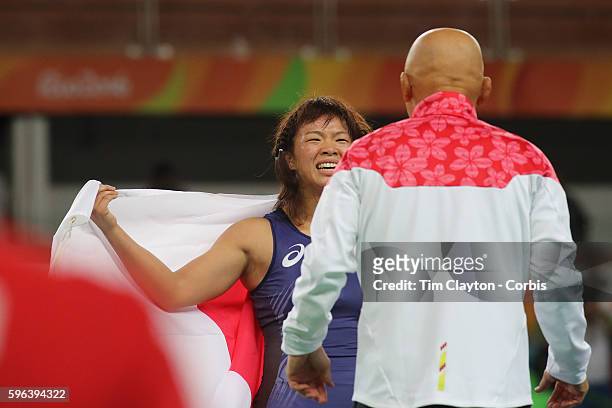 Day 13 Risako Kawai of Japan celebrates her gold medal victory with her coach, Kazuhito Sakae of Japan after her gold medal victory against Maryia...