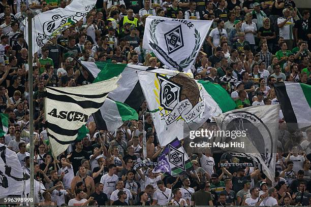 Fans of Moenchengladbach celebrate during the UEFA Champions League Qualifying Play-Offs Round: Second Leg between Borussia Moenchengladbach and YB...