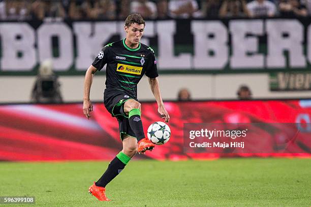 Andreas Christensen of Moenchengladbach with ball during the UEFA Champions League Qualifying Play-Offs Round: Second Leg between Borussia...