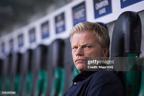 Oliver Kahn, former goalkeeper of Bayern Muenchen sits prior the UEFA Champions League Qualifying Play-Offs Round: Second Leg between Borussia...