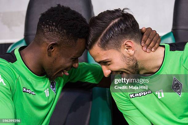 Ibrahima Traoré and Julian Korb of Moenchengladbach joke prior the UEFA Champions League Qualifying Play-Offs Round: Second Leg between Borussia...