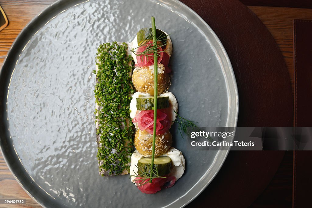 Beautifully plated pickeled herring