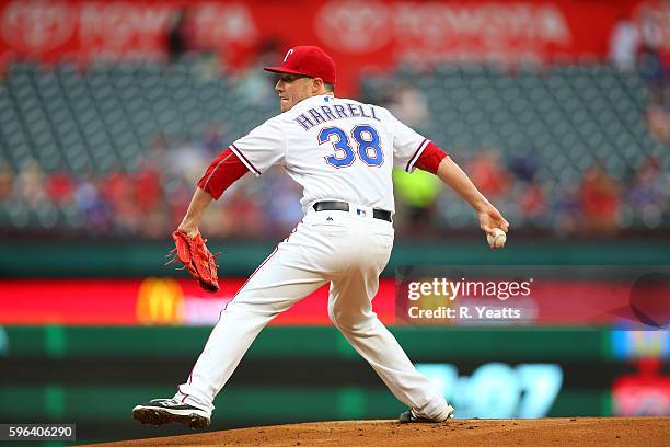 Lucas Harrell of the Texas Rangers throws in the first inning against the Oakland Athletics at Globe Life Park in Arlington on August 16, 2016 in...