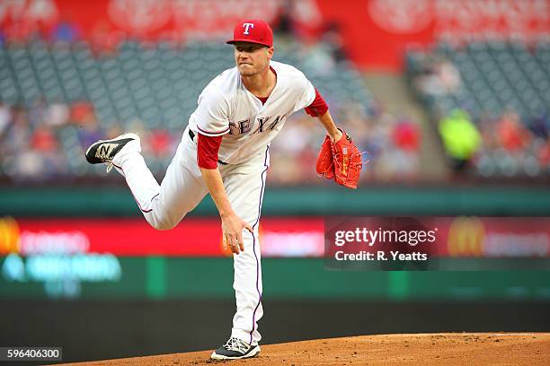 Lucas Harrell of the Texas Rangers throws in the first inning against the Oakland Athletics at Globe Life Park in Arlington on August 16, 2016 in...