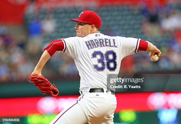 Lucas Harrell of the Texas Rangers throws in the second inning against the Oakland Athletics at Globe Life Park in Arlington on August 16, 2016 in...