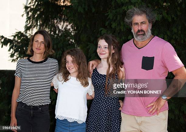 French actress Camille Cottin, French actress Fanie Zanini, French actress Heloise Dugas and French actor Gustave Kervern pose during the photocall...
