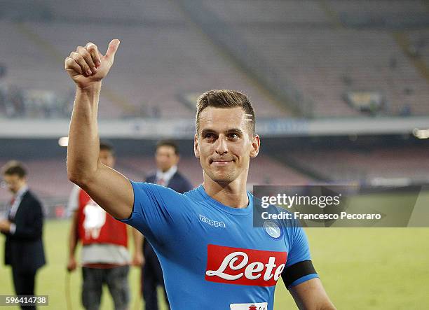 Napoli's player Arkadiusz Milik celebrate the victory after the Serie A match between SSC Napoli and AC Milan at Stadio San Paolo on August 27, 2016...