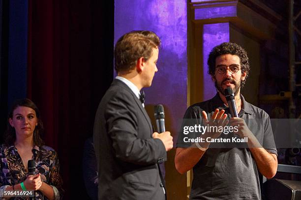 Zacharie Rabehi , Photographer of the Year 2016, during an interview after he won the prize during the award ceremony of the EyeEm photofestival at...