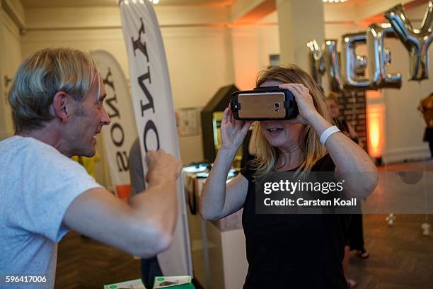 Richard Newstead of Getty Images stays on the stand during the EyeEm photofestival at Heimathafen Neukoelln on August 27, 2016 in Berlin, Germany.