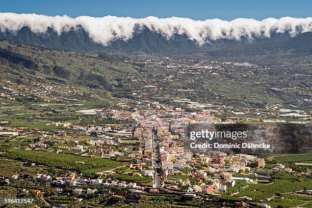 foehn effect over los llanos town (canaries) - tsunami stock pictures, royalty-free photos & images