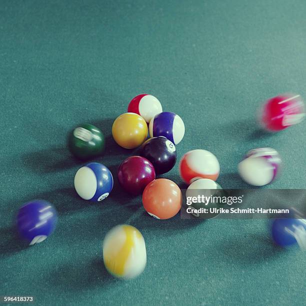 moving billiard balls after being hit by cue ball - snookerkugel stock-fotos und bilder