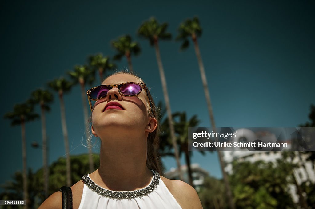 Young woman with sunglasses in