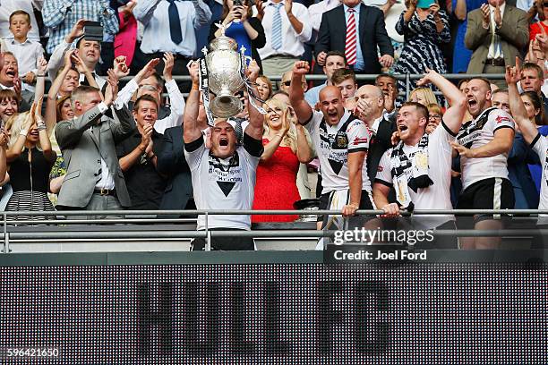 Hull FC captain Gareth Ellis holds aloft the Challenge Cup after winning the Ladbrokes Challenge Cup Final between Hull FC and Warrington Wolves at...