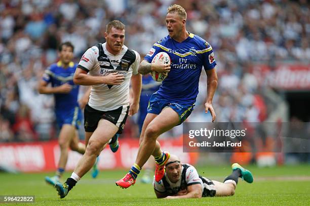 Joe Westerman of Warrington Wolves runs with the ball during the Ladbrokes Challenge Cup Final between Hull FC and Warrington Wolves at Wembley...