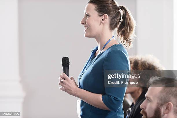 group of people at a business conference - business conference 2015 stock pictures, royalty-free photos & images