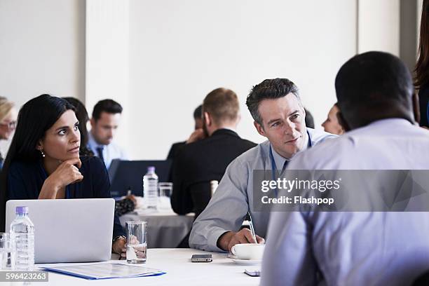 group of people at a business conference - business conference 2015 stock pictures, royalty-free photos & images