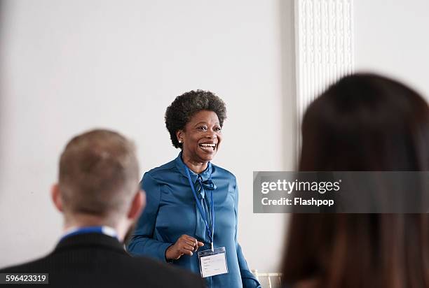 group of people at a business conference - business conference 2015 stock pictures, royalty-free photos & images