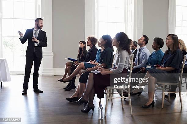 group of people at a business conference - business conference 2015 stock pictures, royalty-free photos & images