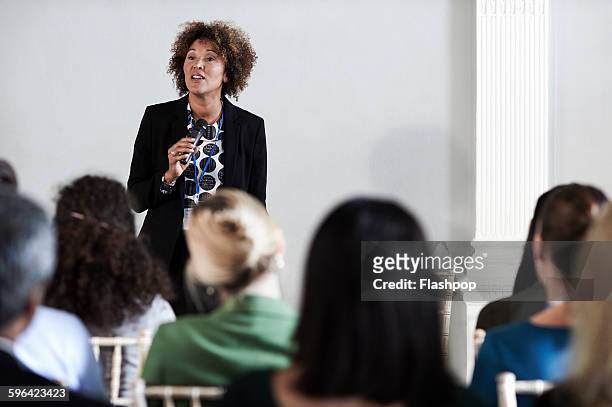 group of people at a business conference - leadership woman photos et images de collection