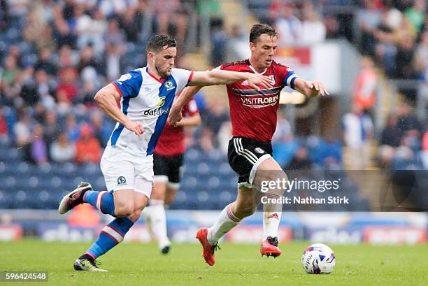 Scott Parker of Fulham and Blackburn's Craig Conway in action during the Sky Bet Championship match between Blackburn Rovers and Fulham at Ewood park...
