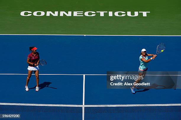 Sania Mirza of India and Monica Niculescu of Romania compete against Kateryna Bondarenko of the Ukraine and Chia-Jung Chuang of Taipei in the women's...