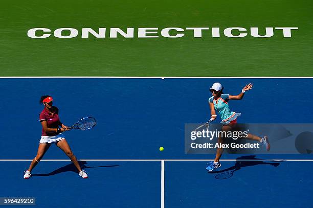 Sania Mirza of India and Monica Niculescu of Romania compete against Kateryna Bondarenko of the Ukraine and Chia-Jung Chuang of Taipei in the women's...