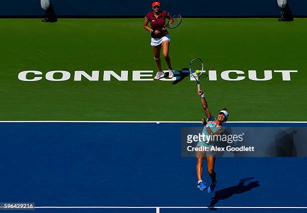 Sania Mirza of India and Monica Niculescu of Romania compete against Kateryna Bondarenko of the Ukraine and Chia-Jung Chuang of Taipei in the women's...