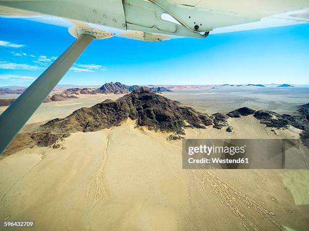 namibia, namib desert, aerial view of namibrand nature reserve - namibia airplane stock-fotos und bilder