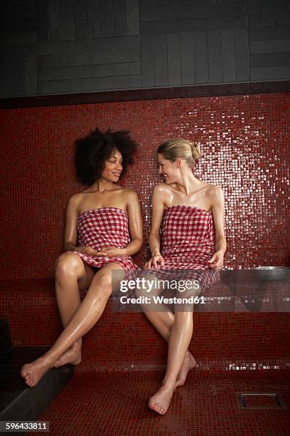 women in hamam - turkish bath stock pictures, royalty-free photos & images