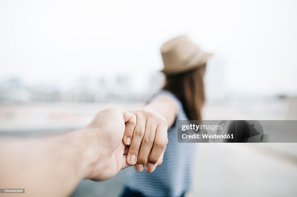 Holding hands, close-up