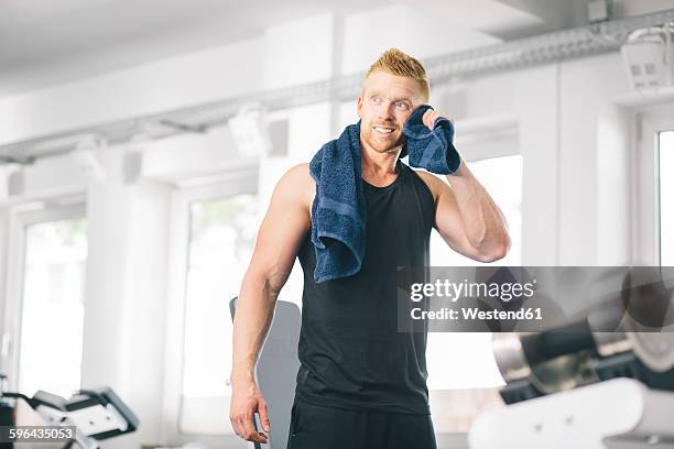 athlete in gym having a break - towel stock pictures, royalty-free photos & images