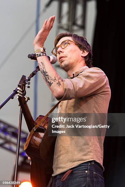 American musician Justin Townes Earle plays guitar as he performs during the Lincoln Center Out of Doors Americanafest NYC at Damrosch Park...