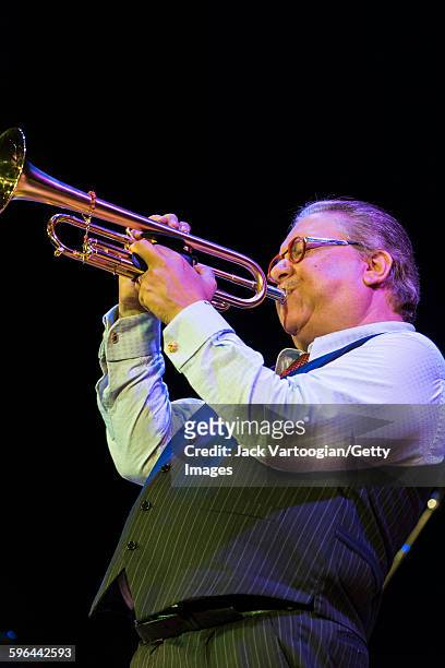 Cuban Jazz musician Arturo Sandoval plays trumpet as he leads his band during a performance at the 92nd Street Y's Kaufmann Concert Hall, New York,...