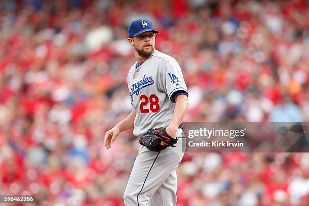 Bud Norris of the Los Angeles Dodgers prepares to throw a pitch during the game against the Cincinnati Reds at Great American Ball Park on August 19,...