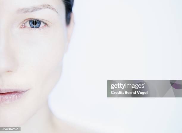 woman with pensive expression - lightskinned stock pictures, royalty-free photos & images