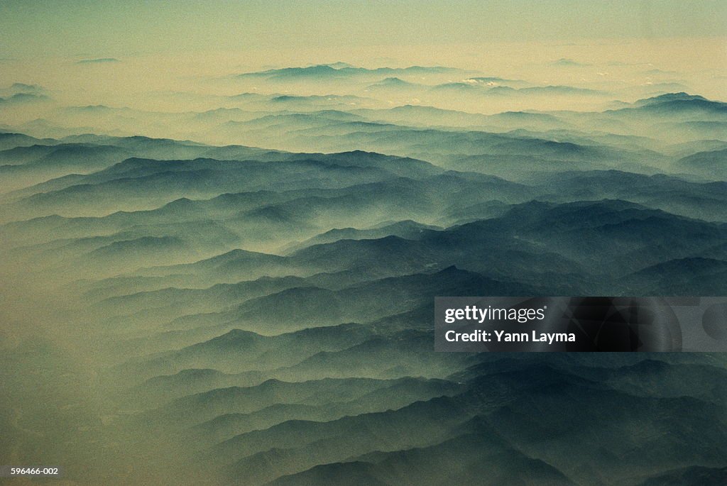 China, Yunnan province, Ailao Shan mountains cloaked in mist, aerial