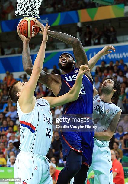 DeMarcus Cousins of the USA drives to the basket during the Men's Gold medal game between Serbia and the USA on Day 16 of the Rio 2016 Olympic Games...