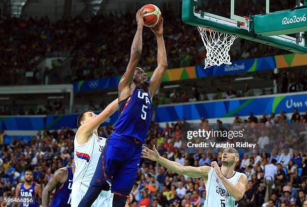 Kevin Durant of the USA dunks the ball during the Men's Gold medal game between Serbia and the USA on Day 16 of the Rio 2016 Olympic Games at Carioca...