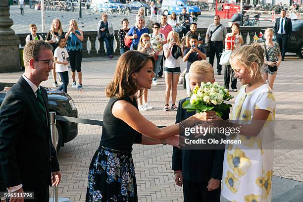 Princess Marie of Denmark receives a bouquet of flowers at her arrival to the international food summit "Better Food For More People" opening...